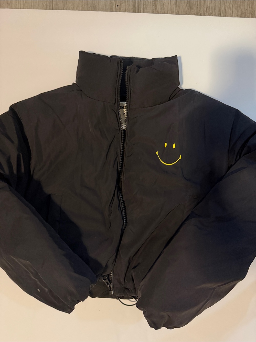 Smiley x H&M Black Puffer Jacket with Yellow Smiley Accent